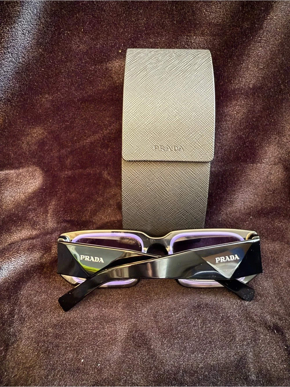 Prada Black sunglasses with violet lens